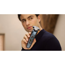 Load image into Gallery viewer, Philips Shaver Series i9000 Wet & Dry with SkinIQ X9001/10 - in use