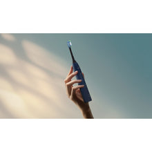 Load image into Gallery viewer, Philips Sonicare Series 5500 Electric Toothbrush, Navy HX7113/04 - in use