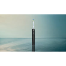 Load image into Gallery viewer, Philips Sonicare 2100 Electric Toothbrush, Black HX4021/02 - lifestyle