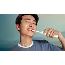 Load image into Gallery viewer, Philips Sonicare 3100 Electric Toothbrush, White HX4031/21 - in use