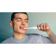 Load image into Gallery viewer, Philips Sonicare 2100 Electric Toothbrush, White HX4021/01 - in use