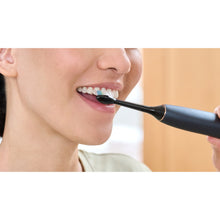 Load image into Gallery viewer, Philips Sonicare W2 Optimal White Brush Heads, Black 6 Pack HX6066/91 - in use