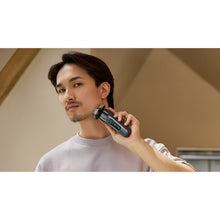 Load image into Gallery viewer, Philips Shaver Series i9000 Wet & Dry with SkinIQ X9001/20 - in use