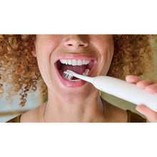 Load image into Gallery viewer, Philips Sonicare A3 Premium All-in-One Brush Heads, White 4 Pack HX9094/14 - in use