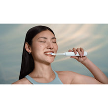 Load image into Gallery viewer, Philips Sonicare Series 6500 Electric Toothbrush with Travel Case, White HX7410/08 - in use