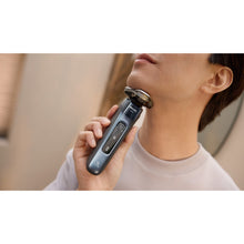 Load image into Gallery viewer, Philips Shaver Series i9000 Wet & Dry with SkinIQ X9001/20 - in use