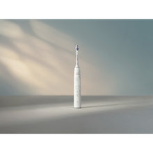 Load image into Gallery viewer, Philips Sonicare Series 6500 Electric Toothbrush with Travel Case, White HX7410/08 - lifestyle