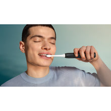 Load image into Gallery viewer, Philips Sonicare 2100 Electric Toothbrush, Black HX4021/02 - in use