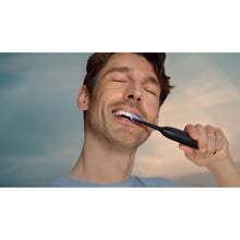 Load image into Gallery viewer, Philips Sonicare Series 7100 Electric Toothbrush with Travel Case, Black HX7421/10 - in use