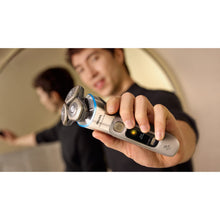 Load image into Gallery viewer, Philips Shaver Series i9000 Prestige Ultra Wet &amp; Dry with SkinIQ Pro XP9403/54 - in use
