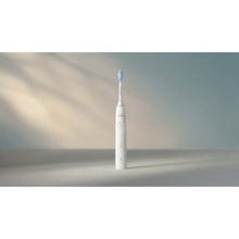 Load image into Gallery viewer, Philips Sonicare Series 5500 Electric Toothbrush, White HX7110/03 - in use
