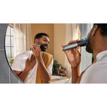 Load image into Gallery viewer, Philips Beard Trimmer Series 7000 with Hair Collector BT7670/15 - in use
