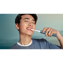 Load image into Gallery viewer, Philips Sonicare 4100 Electric Toothbrush, Marine Blue HX4043/48 - in use
