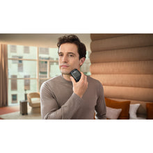Load image into Gallery viewer, Philips Shaver 700 Series Wet &amp; Dry Compact Shaver S792/06 - in use
