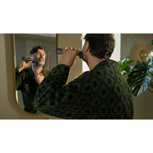 Load image into Gallery viewer, Philips All-in-One Trimmer Series 7000 13-in-1 MG7922/15 - in use
