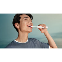 Load image into Gallery viewer, Philips Sonicare 2100 Electric Toothbrush, White HX4021/01 - in use
